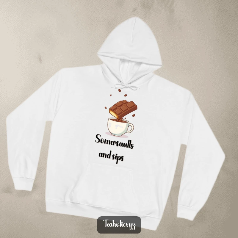 Funny playful chocolate bar doing a somersault over a steaming mug, featured on a cozy hoodie.