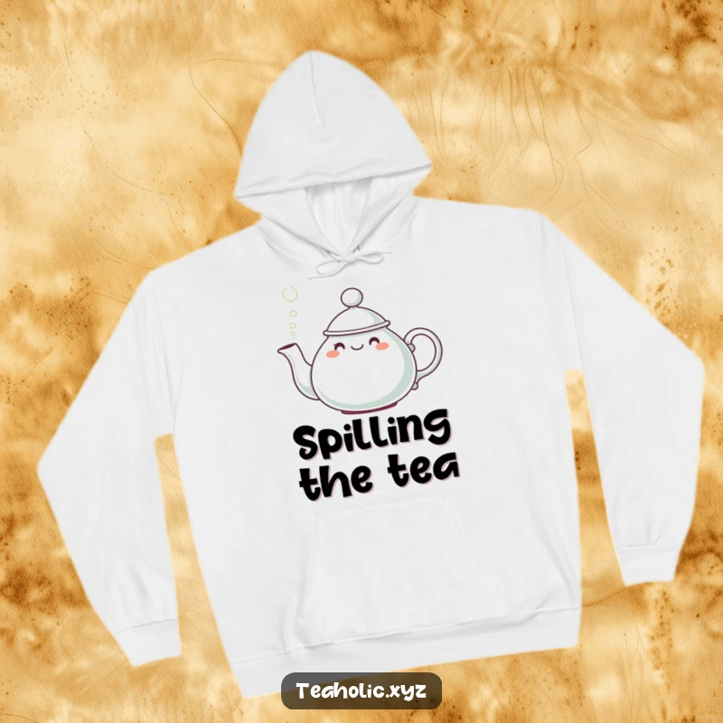 Funny Teapot Character Hoodie: A cute teapot with a hat cheerfully pouring steam in a puff, cozy and stylish.