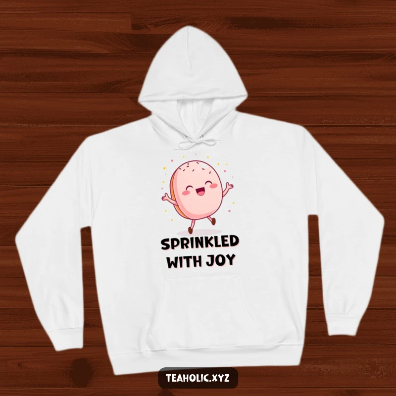 Funny macaroon hoodie showcasing a delighted pastry doing a happy dance with sprinkles, perfect for cozying up.