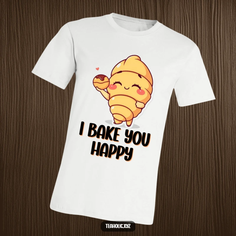 Funny Croissant T-Shirt: A winking croissant character presents a tiny pastry, embodying playful charm and baked good goodness.